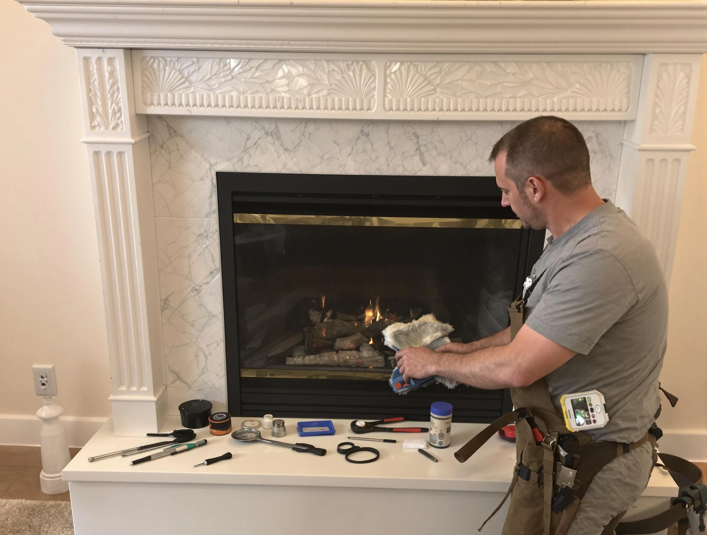 New Bedford Chimney Sweep performing fireplace maintenance in New Bedford, MA